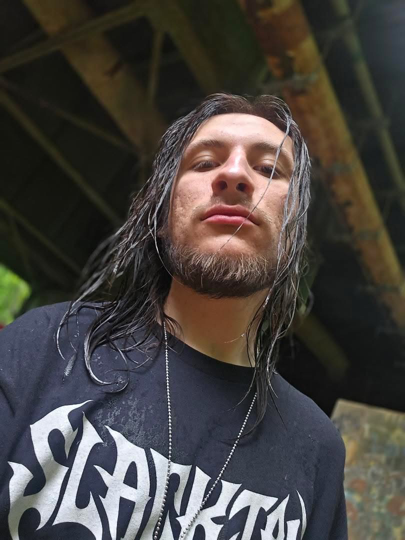 William of Comedia Dystopia, vocals and guitar